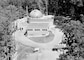 Black and white photo of SM-1 building surrounded by trees at Fort Belvoir.