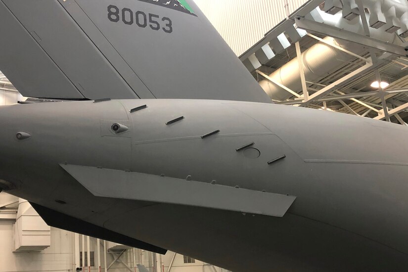 Small metal devices attached to the aft end of a C-17 Globemaster.