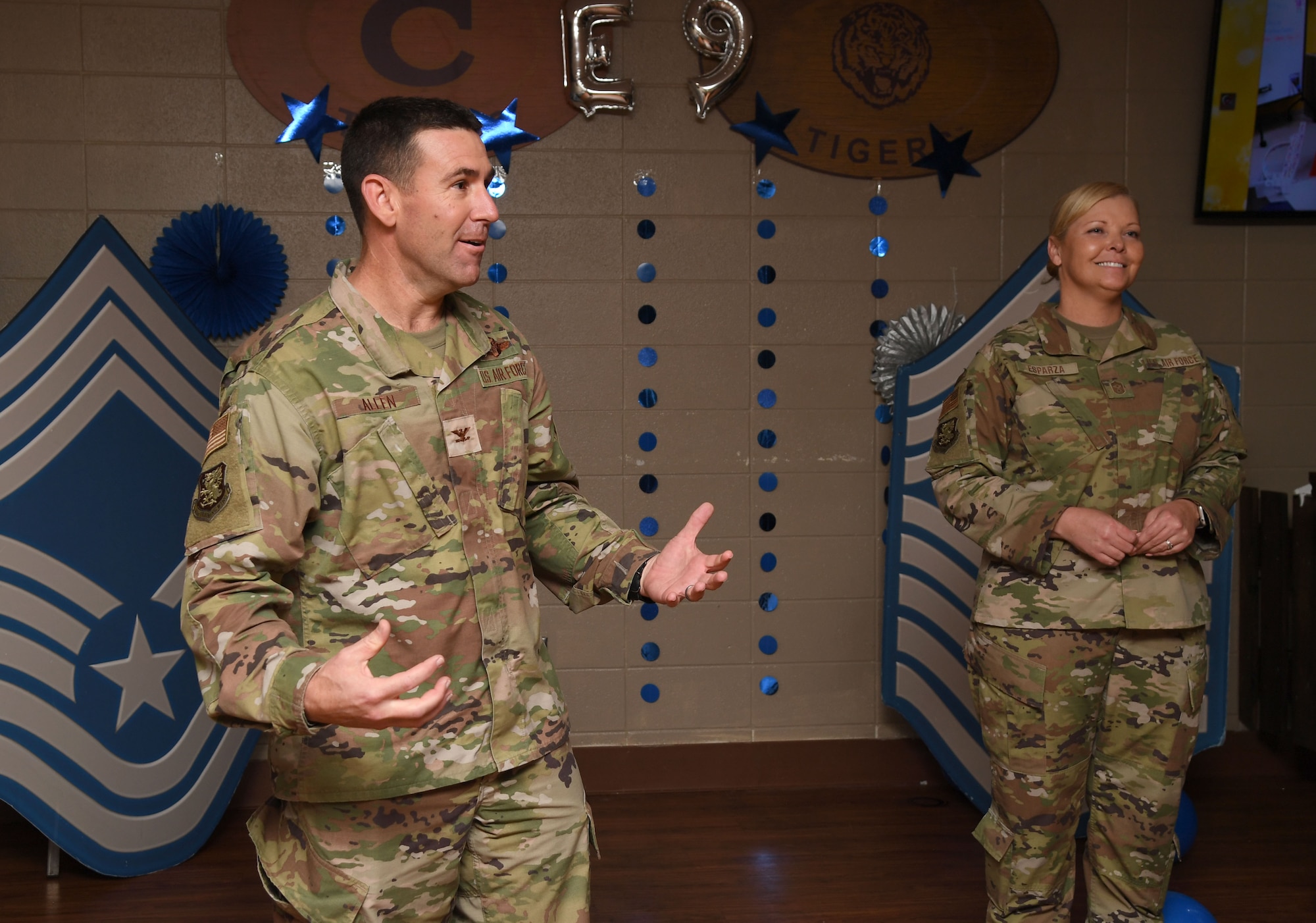 U.S. Air Force Col. Jason Allen, 81st Training Wing vice commander, and Chief Master Sgt. Sarah Esparza, 81st TRW command chief, deliver comments during the chief master sergeant release ceremony inside Gaude Lanes at Keesler Air Force Base, Mississippi, Dec. 6, 2022.