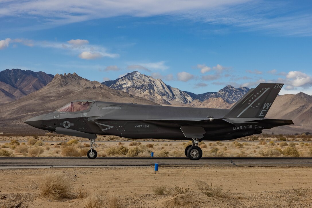 A U.S. Marine Corps F-35B Lightning II from Marine Fighter Attack Squadron 214, Marine Aircraft Group 13, 3rd Marine Aircraft Wing (MAW), taxis into the forward arming and refueling point during exercise Steel Knight 23 on Inyokern Airfield, California, Dec. 2, 2022. Exercise Steel Knight 23 provides 3rd MAW an opportunity to refine Wing-level warfighting in support of I Marine Expeditionary Force and fleet maneuver. (U.S. Marine Corps photo by Lance Cpl. Alex Devereux)