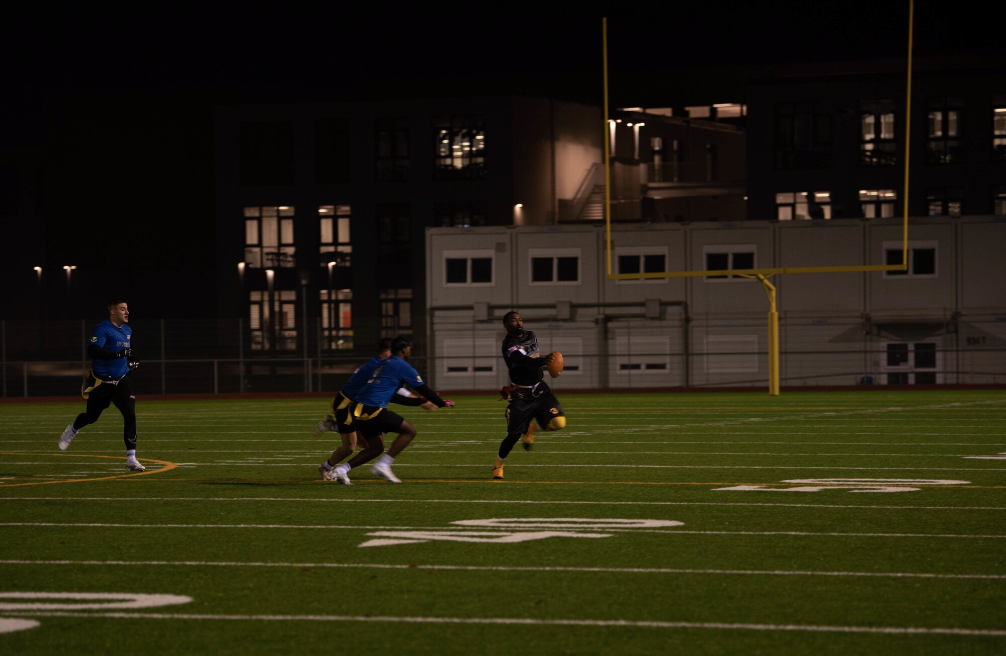 Airman and Soldiers play flag football