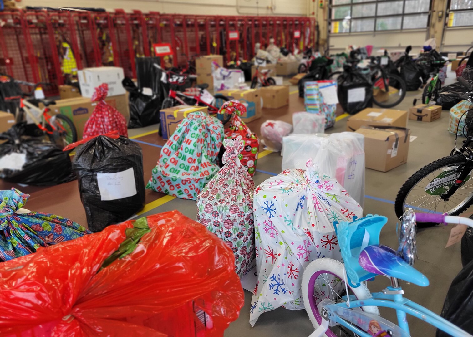 DLA Aviation’s Angel Tree program bring all things merry and bright to local school children
