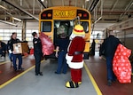 DLA Aviation’s Angel Tree program bring all things merry and bright to local school children