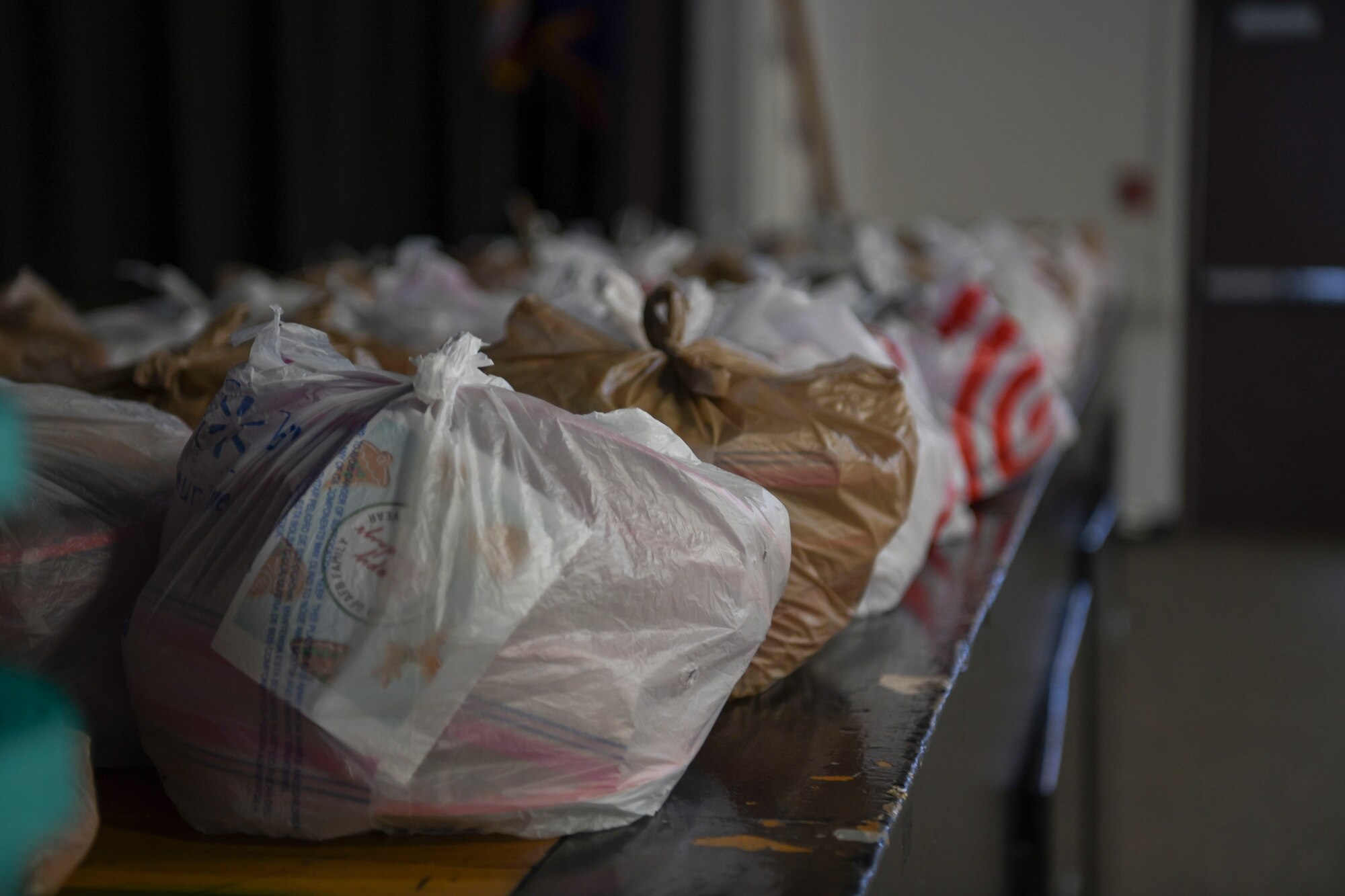 Bags full of cookies sit on a table