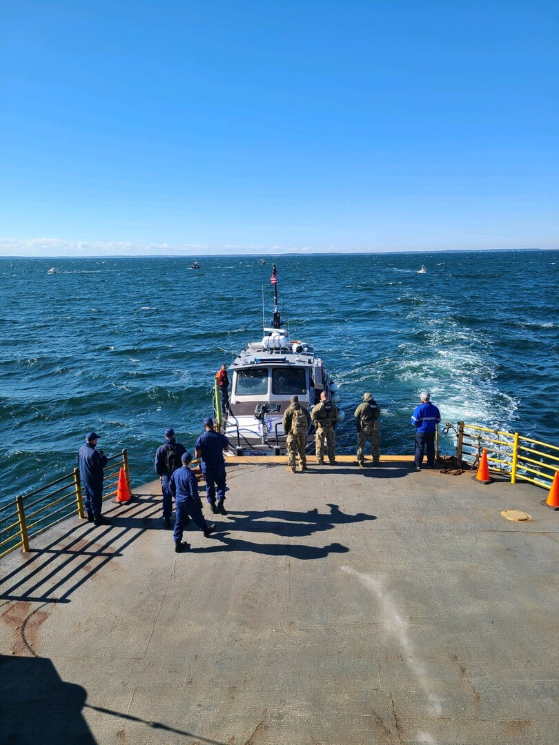 Suffolk County, New York, police department attempts to maneuver its boat for a stern embarkation on the ferry Cape Henlopen, during Sector Long Island Sounds second embarkation drill while other partners await their turn in October 2022.