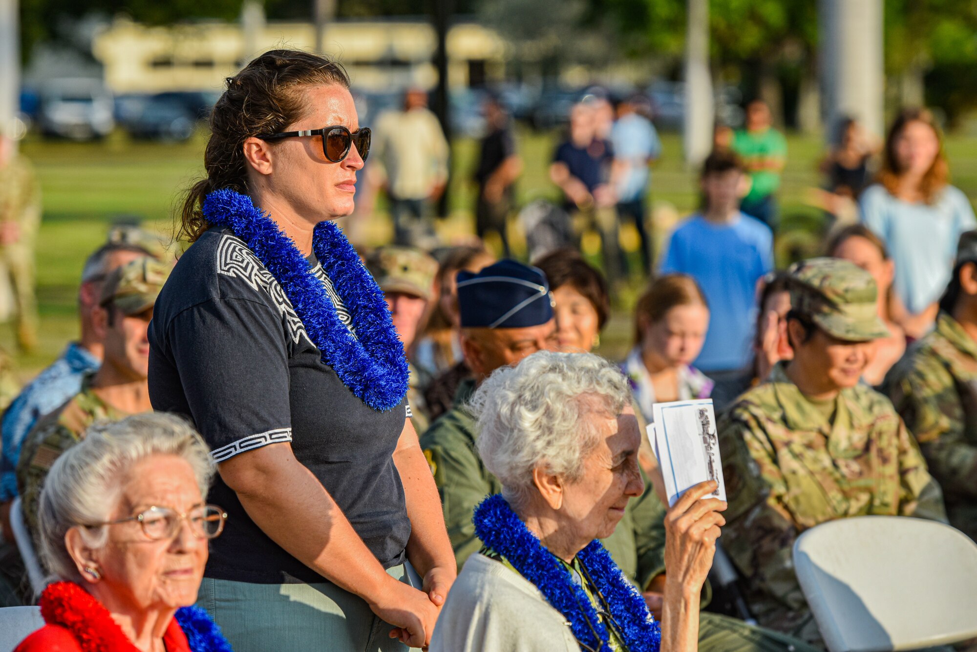 Friends and family of late Hickam Field veteran survivors present a wreath at the Attack on Hickam Field Remembrance Ceremony at Joint Base Pearl Harbor-Hickam, Hawaii, Dec. 7, 2022. The 15th Wing continues to honor those who survived the historic attacks,  those who paid the ultimate sacrifice and their families while reminding those who currently serve of the legacy of those who came before. (U.S. Air Force Photo by Tech. Sgt. Anthony Nelson Jr.)
