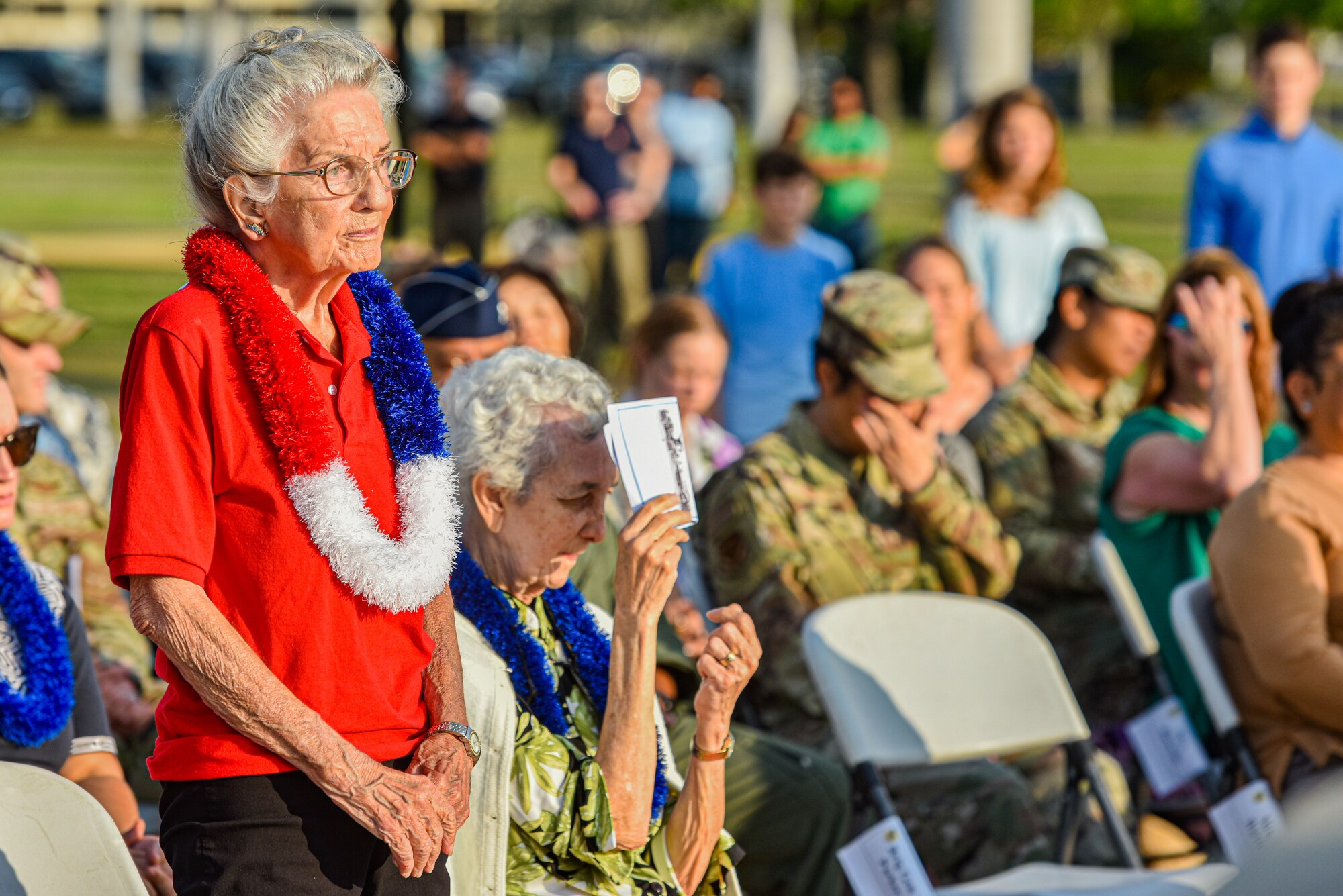 Friends and family of late Hickam Field veteran survivors present a wreath at the Attack on Hickam Field Remembrance Ceremony at Joint Base Pearl Harbor-Hickam, Hawaii, Dec. 7, 2022. The 15th Wing continues to honor those who survived the historic attacks,  those who paid the ultimate sacrifice and their families while reminding those who currently serve of the legacy of those who came before. (U.S. Air Force Photo by Tech. Sgt. Anthony Nelson Jr.)