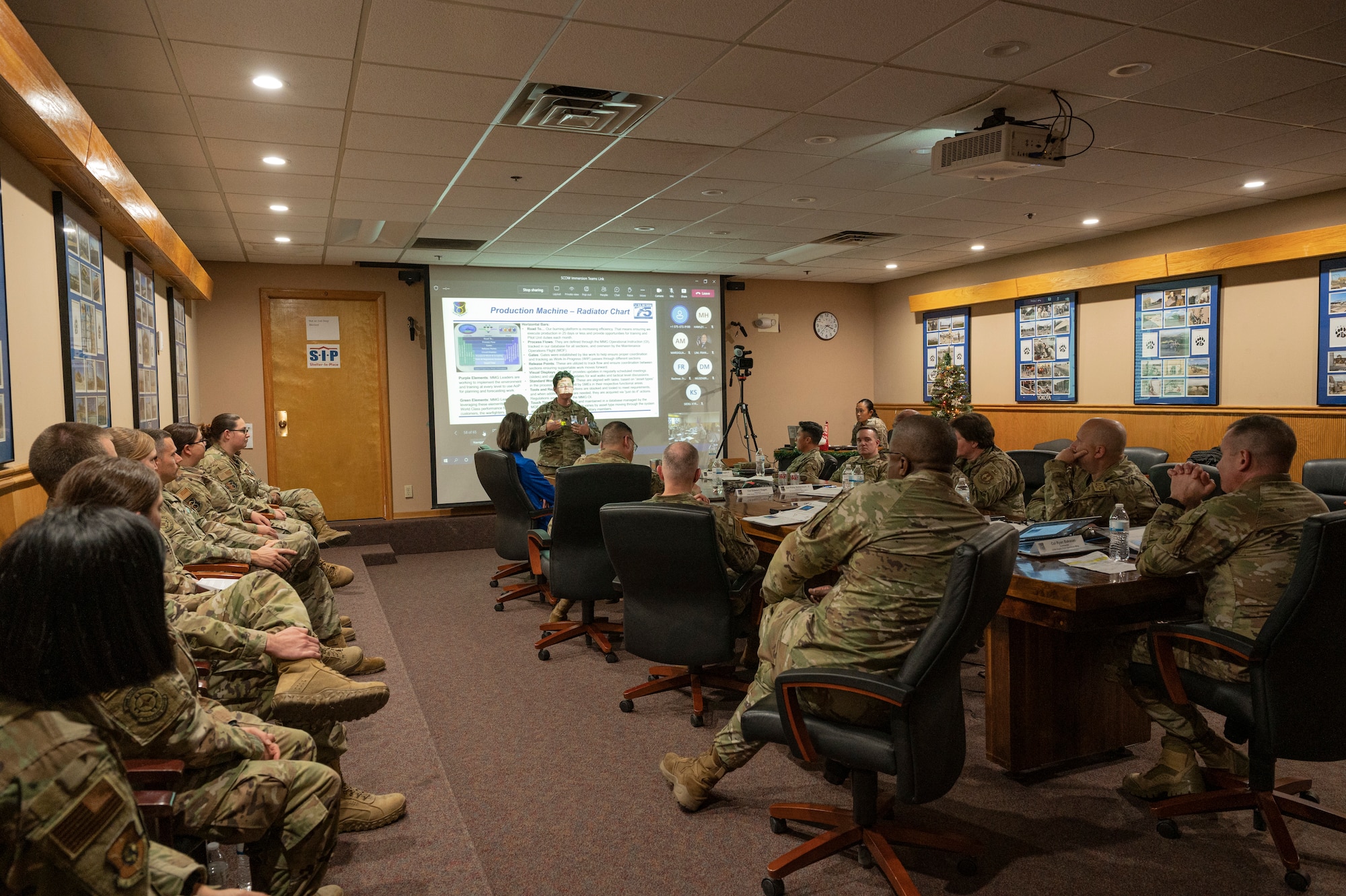 U.S. Air Force Lt. Col. Rebecca Corbin, 635th Materiel Maintenance Group deputy commander, gives a briefing to the U.S. Air Force Lt. Gen. Stacey Hawkins, Air Force Sustainment Center commander and his team at Holloman Air Force Base, New Mexico, Dec. 6, 2022. The 635th MMG’s primary goal is to provide equipment, training and fuel support to both the Department of Defense and civilian partners on a global scale. (U.S. Air Force photo by Airman 1st Class Isaiah Pedrazzini)