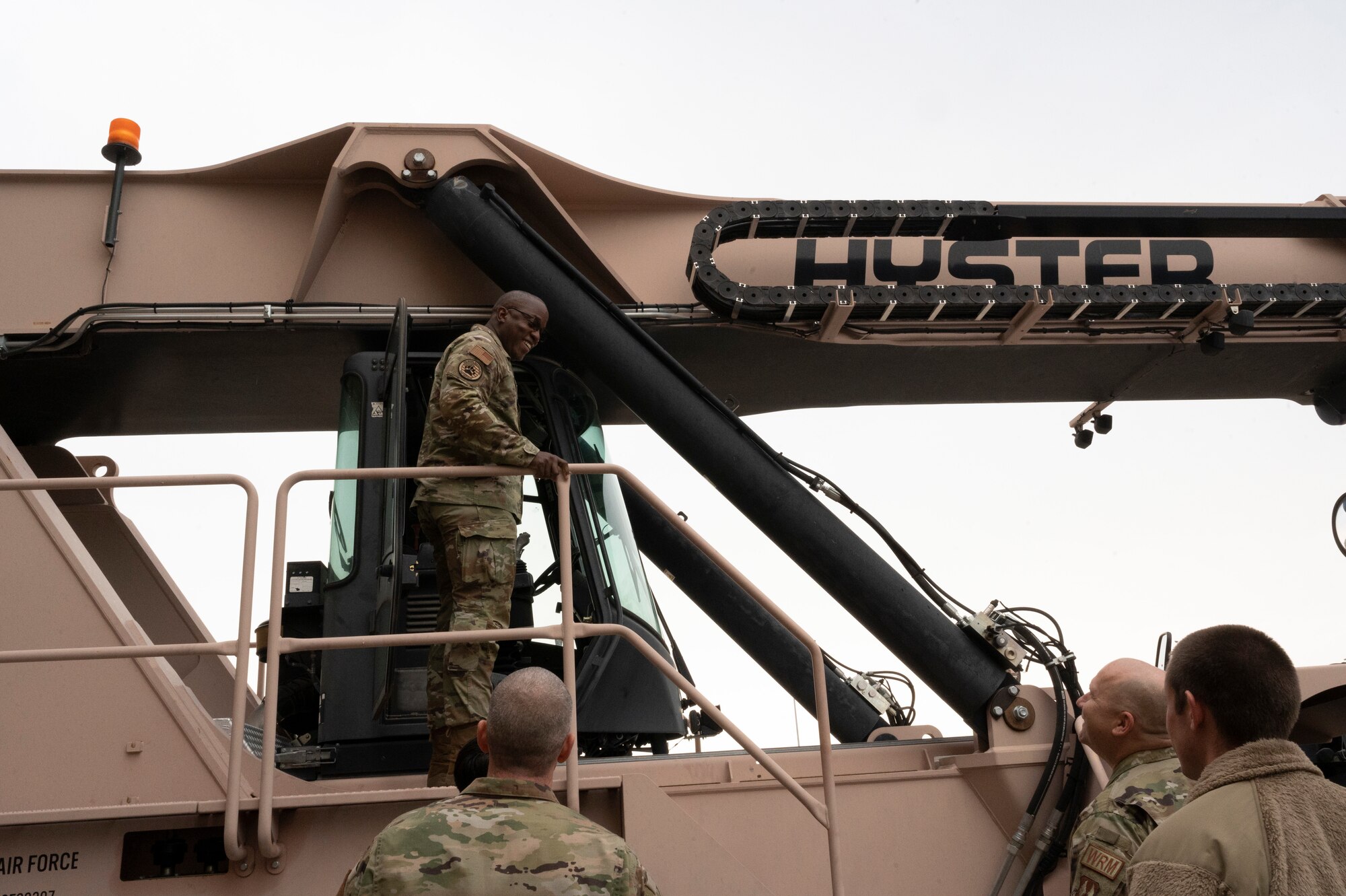 U.S. Air Force Lt. Gen. Stacey Hawkins, Air Force Sustainment Center commander, prepares to drive a Hyster Yardmaster II Reach Stacker during an immersion tour with the 635th Materiel Maintenance Group at Holloman Air Force Base, New Mexico, Dec. 7, 2022. The 635th MMG provides humanitarian support, natural disasters responses and the reconstitution of equipment on a global scale. (U.S. Air Force photo by Airman 1st Class Isaiah Pedrazzini)