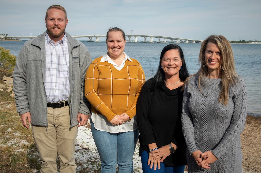 (Left to right) Matt Vowell, Lauren Hansen, Amy Hayes and Tiffany Finch, are initial personnel of the New Professionals Development Program - Logistics. The Integrated Logistics Support Division (E50) at Naval Surface Warfare Center Panama City Division, recently joined a new program to provide developmental guidance to new logistics personnel during their first one to three years as professional members of this activity. (U.S. Navy photo by Eddie Green)