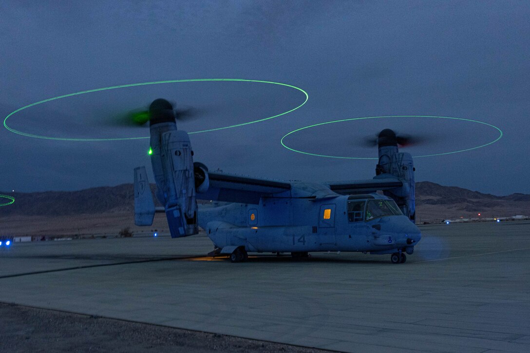 A U.S. Marine Corps MV-22B Osprey with Marine Medium Tilt Rotor Squadron 165, Marine Air Group 16, 3rd Marine Aircraft Wing (MAW), refuels at a forward arming and refueling point Dec. 1, 2022, on Camp Wilson, Marine Corps Air Ground Combat Center Twentynine Palms, Cailfornia, during Steel Knight 23. Exercise Steel Knight 23 provides 3rd MAW an opportunity to refine Wing-level warfighting in support of I Marine Expeditionary Force and fleet maneuver. (U.S. Marine Corps photo by Lance Cpl. Hutchinson)