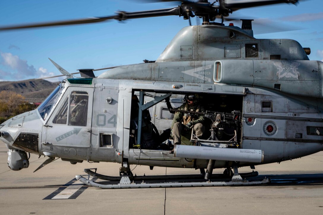 A U.S. Marine Corps UH-1Y Venom with Marine Light Attack Helicopter Squadron 369, Marine Aircraft Group 39, 3rd Marine Aircraft Wing, prepares to take off for a flight to the amphibious assault ship USS Tripoli (LHA 7) during exercise Steel Knight 23, on Marine Corps Air Station Camp Pendleton, California, Dec. 5, 2022. Exercise Steel Knight provides 3rd MAW an opportunity to refine Wing-level warfighting in support of I Marine Expeditionary Force and fleet maneuver. (U.S. Marine Corps photo by Sgt. Fletcher)