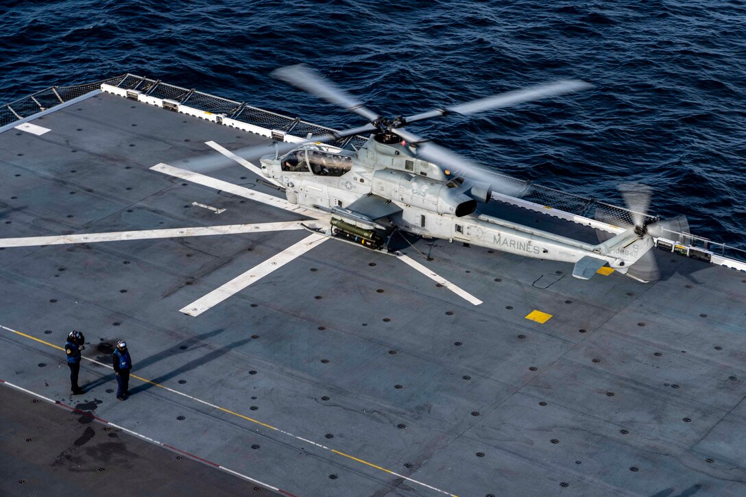 A U.S. Marine Corps AH-1Z Viper with Marine Light Attack Helicopter Squadron 369, Marine Aircraft Group 39, 3rd Marine Aircraft Wing, lands aboard the amphibious assault ship USS Tripoli (LHA 7) during exercise Steel Knight 23, Dec. 5, 2022. Exercise Steel Knight provides 3rd MAW an opportunity to refine Wing-level warfighting in support of I Marine Expeditionary Force and fleet maneuver. (U.S. Marine Corps photo by Sgt. Fletcher)