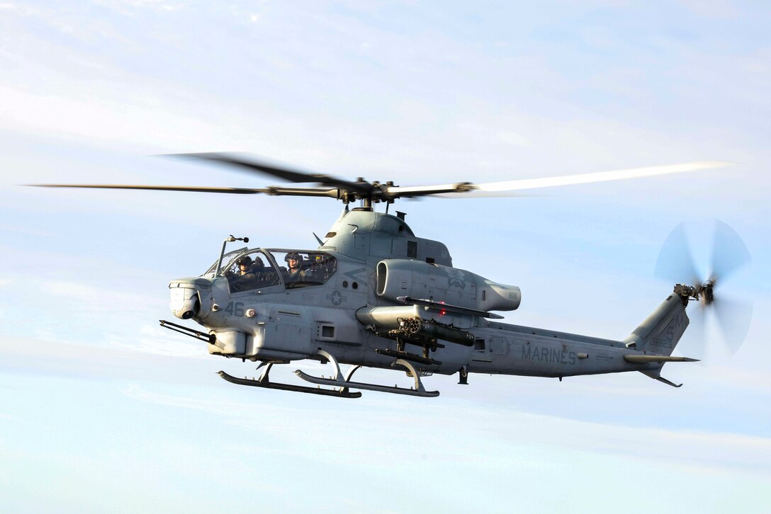 A U.S. Marine Corp AH-1Z Viper with Marine Light Attack Helicopter Squadron 369, Marine Aircraft Group 39, 3rd Marine Aircraft Wing, hovers over the Pacific Ocean during exercise Steel Knight 23, Dec. 6, 2022. Exercise Steel Knight provides 3rd MAW an opportunity to refine Wing-level warfighting in support of I Marine Expeditionary Force and fleet maneuver. (U.S. Marine Corps photo by Sgt. Fletcher)