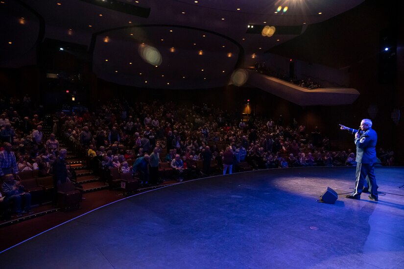 Chief Master Sgt. Kevin Burns, Chief of Marketing and trumpet player for The United States Air Force Band’s Airmen of Note, recognizes more than 500 veterans for their service at the Chandler Center for the Arts, Chandler, Arizona, Nov. 11, 2022. Burns has performed with an extensive lineup of notable artists and has arranged and played on hundreds of recording sessions, including projects for Disney, ESPN, and ABC Sports. (U.S. Air Force photo by Airman Bill Guilliam)