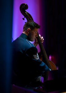 U.S. Air Force Tech. Sgt. Ben Thomas, bassist for The United States Air Force Band’s Airmen of Note, performs at Fox Theater in Tucson, Arizona, Nov. 12, 2022. Stationed at Joint Base Anacostia-Bolling in Washington, D.C., Airmen of Note is one of six musical ensembles that form The U.S. Air Force Band. (U.S. Air Force photo by Airman Bill Guilliam)