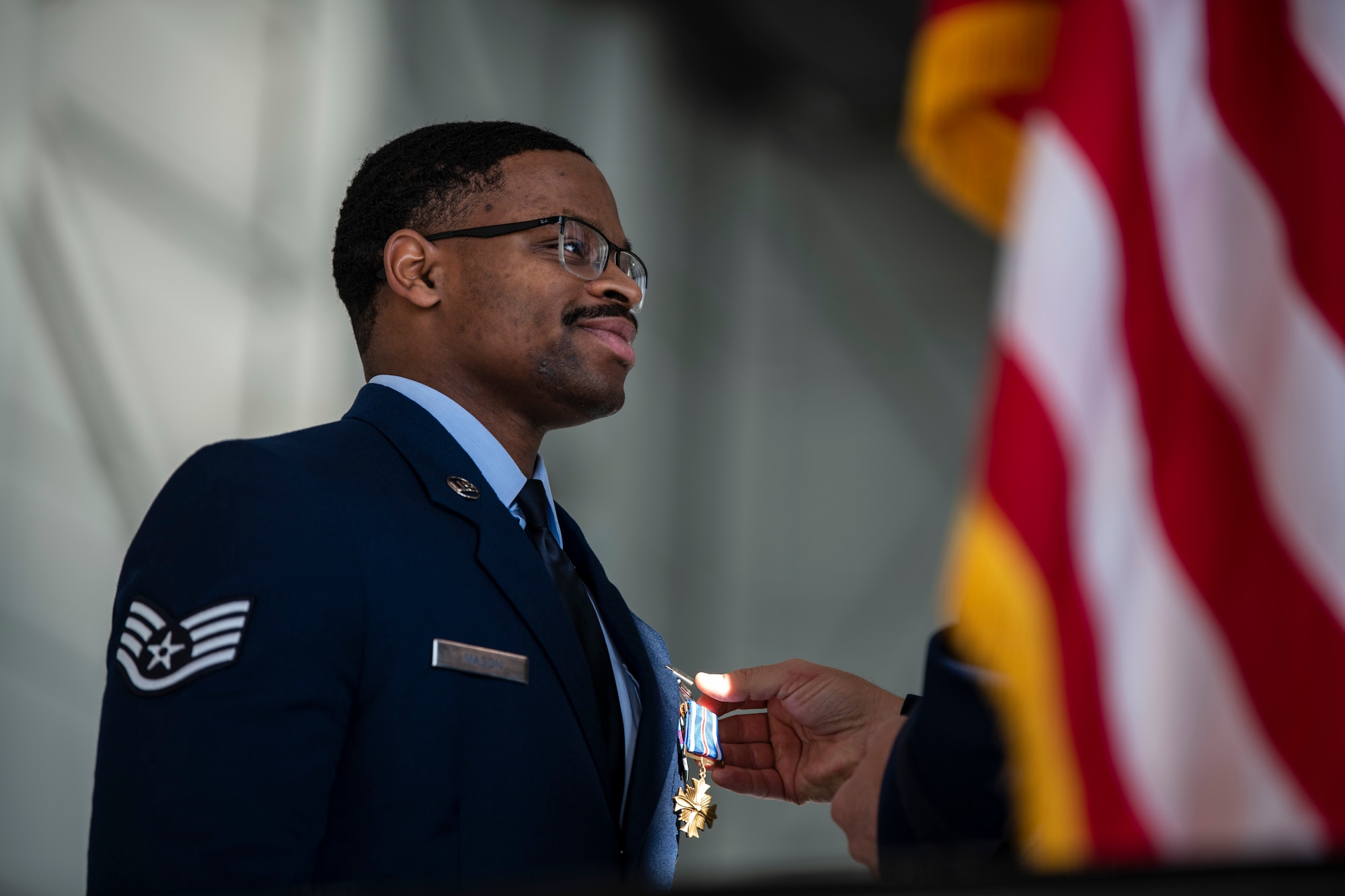 Man receives military award.