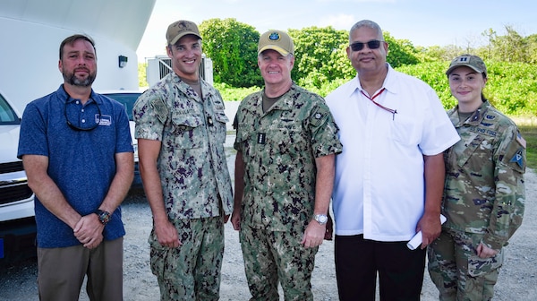 Adm. Samuel Paparo poses for a photo with personnel assigned to Naval Computer and Telecommunications Station (NCTS) Diego Garcia.