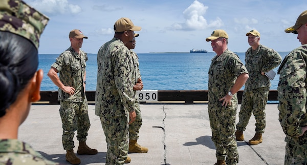 Adm. Samuel Paparo speaks with personnel assigned to Port Operations and Naval Supply Systems Command (NAVSUP) aboard Naval Support Facility Diego Garcia.