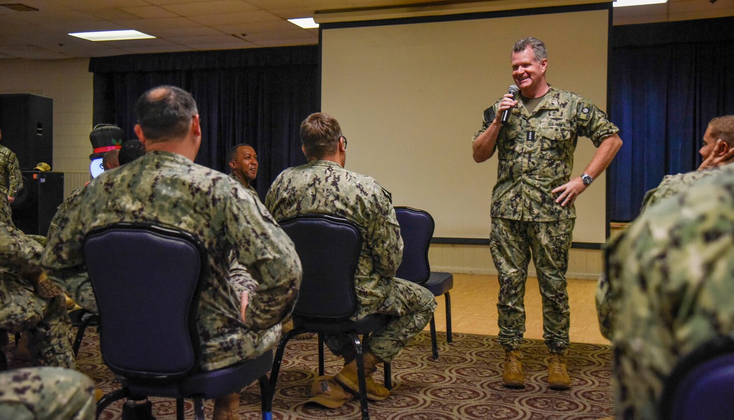 Adm. Samuel Paparo speaks with service members during an all hands call.