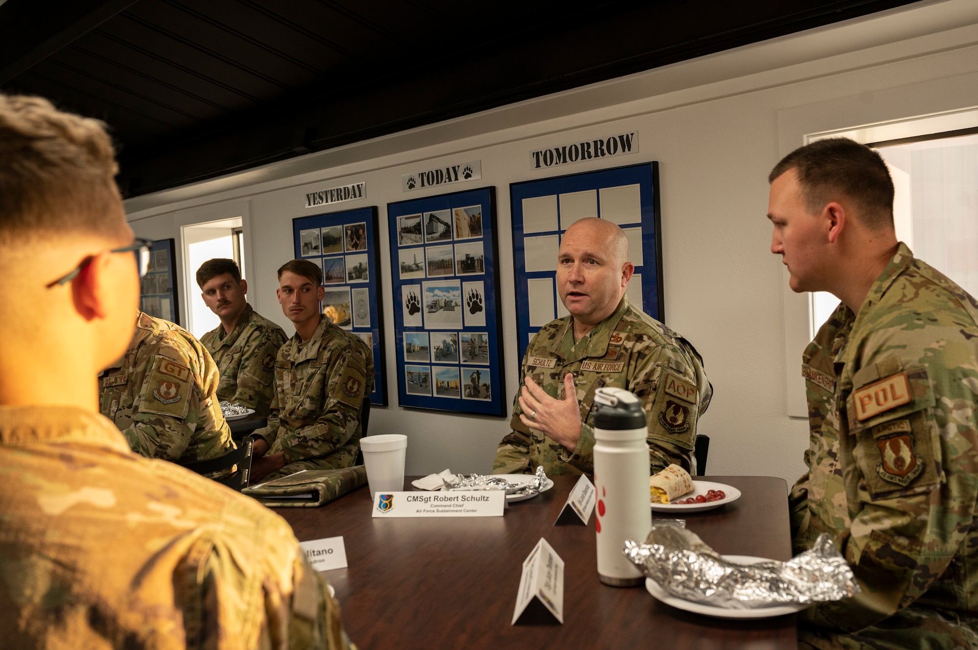 U.S. Air Force Chief Master Sgt. Robert Schultz, Air Force Sustainment Center command chief chats with Airmen from the 635th Materiel Maintenance Group at Holloman Air Force Base, New Mexico, Dec. 6, 2022. The 635th MMG consists of a highly-trained diverse group of Airmen who provide mission-ready equipment for future deployments. (U.S. Air Force photo by Airman 1st Class Isaiah Pedrazzini)