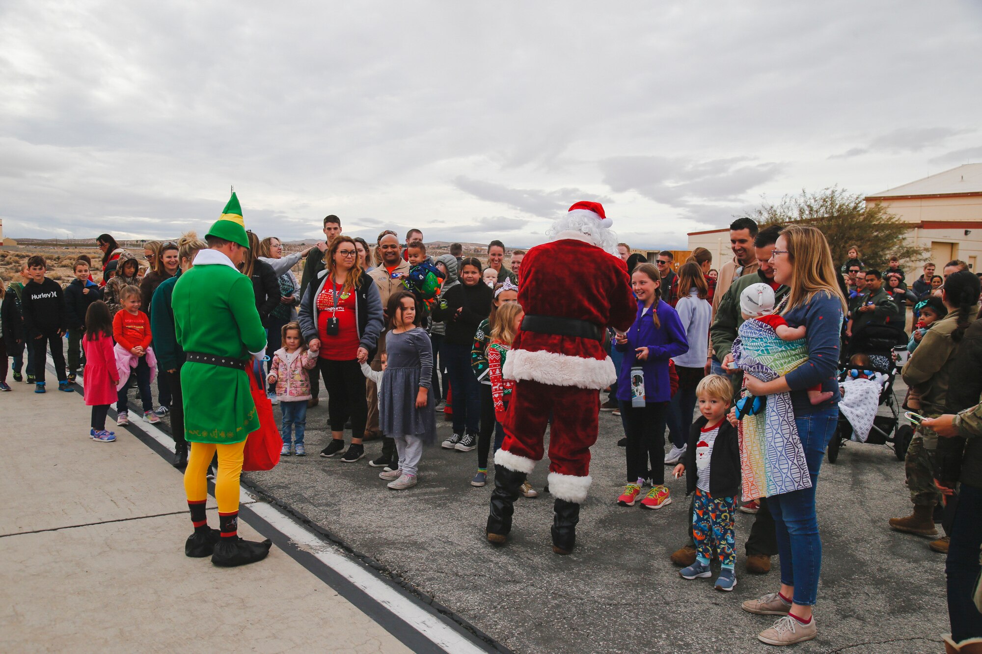 Instead of reindeer, Santa Claus comes to town... on an F-16! Santa Claus and one of his elves visited Edwards Air Force Base on an F-16 Fighting Falcon greeting base personnel and their families at a holiday party put on by the 416th Flight Test Squadron spreading holiday cheer on base... the Edwards style!