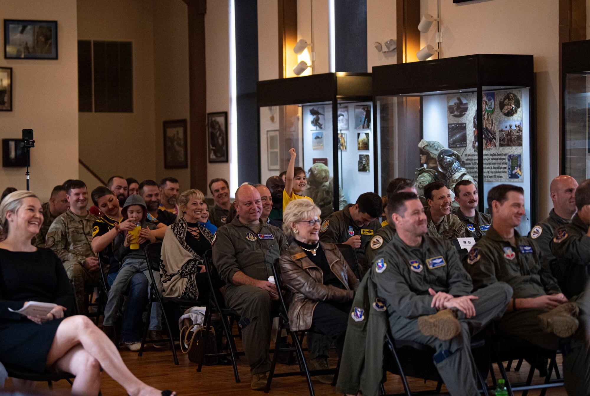 Members of the 81st Fighter Squadron gather with their friends and families at Moody Air Force Base Georgia, Dec. 5, 2022, in honor of the squadron's deactivation. The 81st FS was a tenant unit at Moody AFB, originally activated out of Key Field, Mississippi, which was loaned out to Air Combat Command’s 23rd Wing. (U.S. Air Force photo by Airman 1st Class Whitney Gillespie)