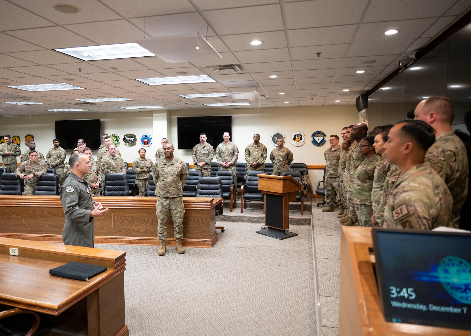 Lt. Gen. Scott L. Pleus, 7th Air Force commander (left), and Chief Master Sgt. Alvin R. Dyer, 7th AF command chief (center), speak with Airmen during their visit to Kunsan Air Base, Republic of Korea, Dec. 7, 2022. The 7th AF leadership team recognized several outstanding performers during their visit. (U.S. Air Force photo by Staff Sgt. Isaiah J. Soliz)