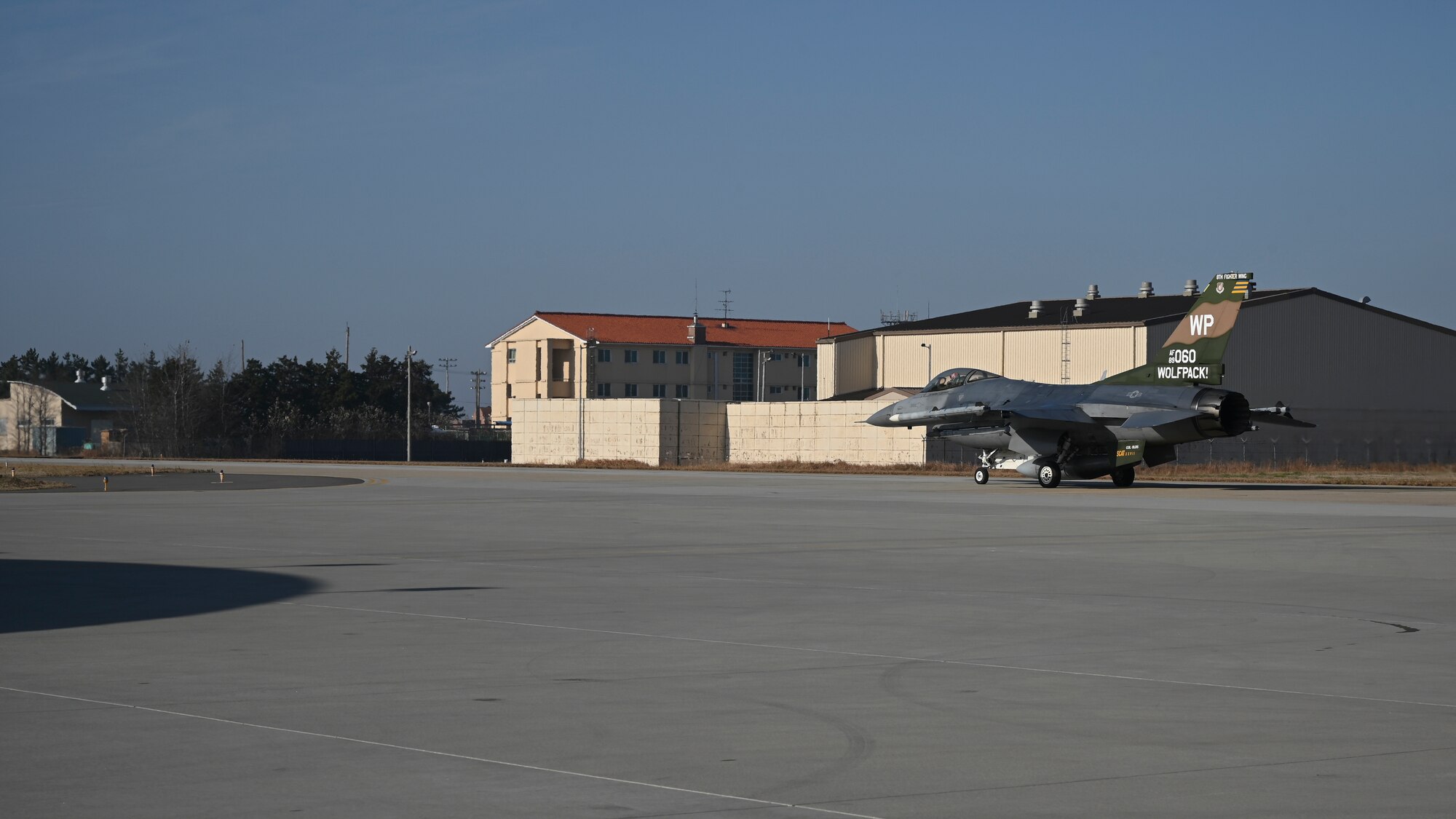 Lt. Gen. Scott L. Pleus, 7th Air Force commander, taxis in an F-16 Fighting Falcon on the flightline at Kunsan Air Base, Republic of Korea, Dec. 8, 2022. Pleus is a command pilot with more than 2,500 combat flying hours during operations Desert Fox and Southern Watch. (U.S. Air Force photo by Senior Airman Akeem K. Campbell)