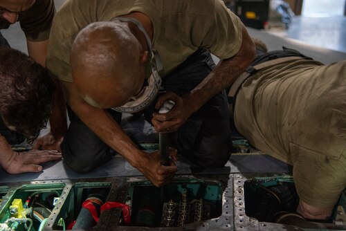 Senior Airman Wesley Tynes, 389th Expeditionary Fighter Generation Squadron, Phase Section crew chief, conducts an inspection on an F-15E Strike Eagle at an undisclosed location, Southwest Asia, Nov. 15, 2022. The Phase Section performs preventative maintenance through exhaustive inspections to detect failing components before they cause operational problems. (U.S. Air Force photo by: Tech. Sgt. Jim Bentley)