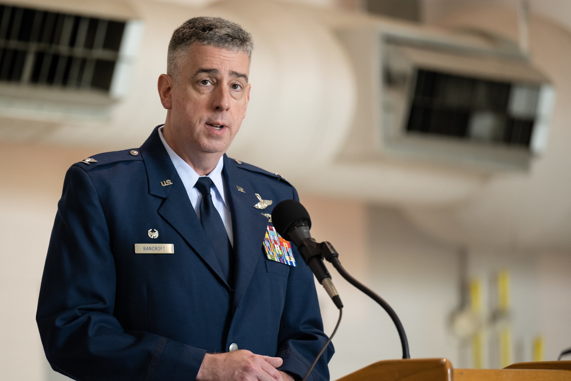 Col. Michael A. Cooper, commander of the 123rd Medical Group, retires from military service during a ceremony at the Kentucky Air National Guard Base in Louisville, Ky., Sept. 11, 2022. Cooper served for 30 years in the Kentucky Army National Guard, Air Force Reserve and Kentucky Air National Guard. (U.S. Air National Guard photo by Dale Greer)