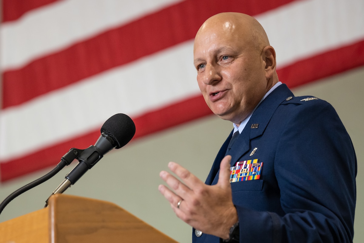 Col. Michael A. Cooper, commander of the 123rd Medical Group, retires from military service during a ceremony at the Kentucky Air National Guard Base in Louisville, Ky., Sept. 11, 2022. Cooper served for 30 years in the Kentucky Army National Guard, Air Force Reserve and Kentucky Air National Guard. (U.S. Air National Guard photo by Dale Greer)