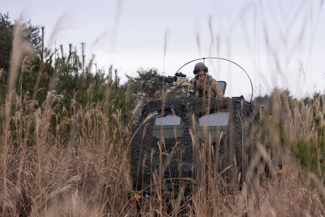 U.S. Marines with 3d Battalion, 12th Marines execute a simulated fire mission with an M142 High Mobility Artillery Rocket System during Artillery Relocation Training Program 22.3 at Ojojihara Maneuver Area, Miyagi, Japan, Dec. 6, 2022.