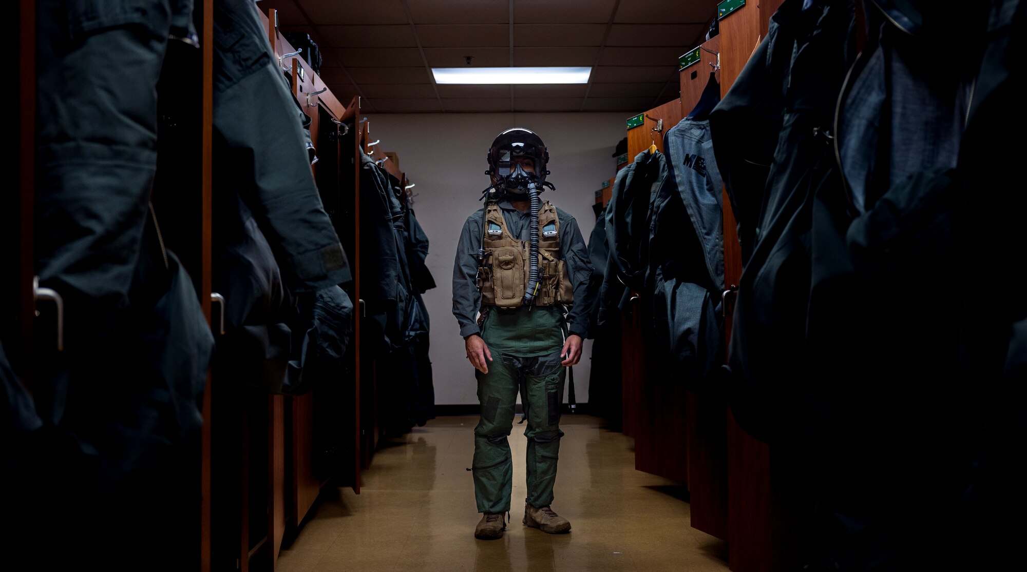 Staff Sgt. Mathew Wilson, 51st Operations Support Squadron aircrew flight equipment (AFE) shift lead, poses for a photo after being fitted for a flight during training at Osan Air Base, Republic of Korea, Dec. 7, 2022.