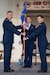 Col. Hans F. Otto, right, accepts the guidon of the 123rd Medical Group from Col. Bruce Bancroft, commander of the 123rd Airlift Wing, during a change-of-command ceremony at the Kentucky Air National Guard Base in Louisville, Ky., Sept. 11, 2022. Otto is replacing Col. Michael A. Cooper, who has served as the group’s commander since 2014 and is retiring. (U.S. Air National Guard photo by Dale Greer)