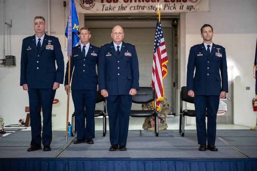Col. Hans F. Otto, right, assumes command of the 123rd Medical Group during a ceremony at the Kentucky Air National Guard Base in Louisville, Ky., Sept. 11, 2022. Otto is replacing Col. Michael A. Cooper, second from right, who has led the group since 2014 and is retiring. (U.S. Air National Guard photo by Dale Greer)
