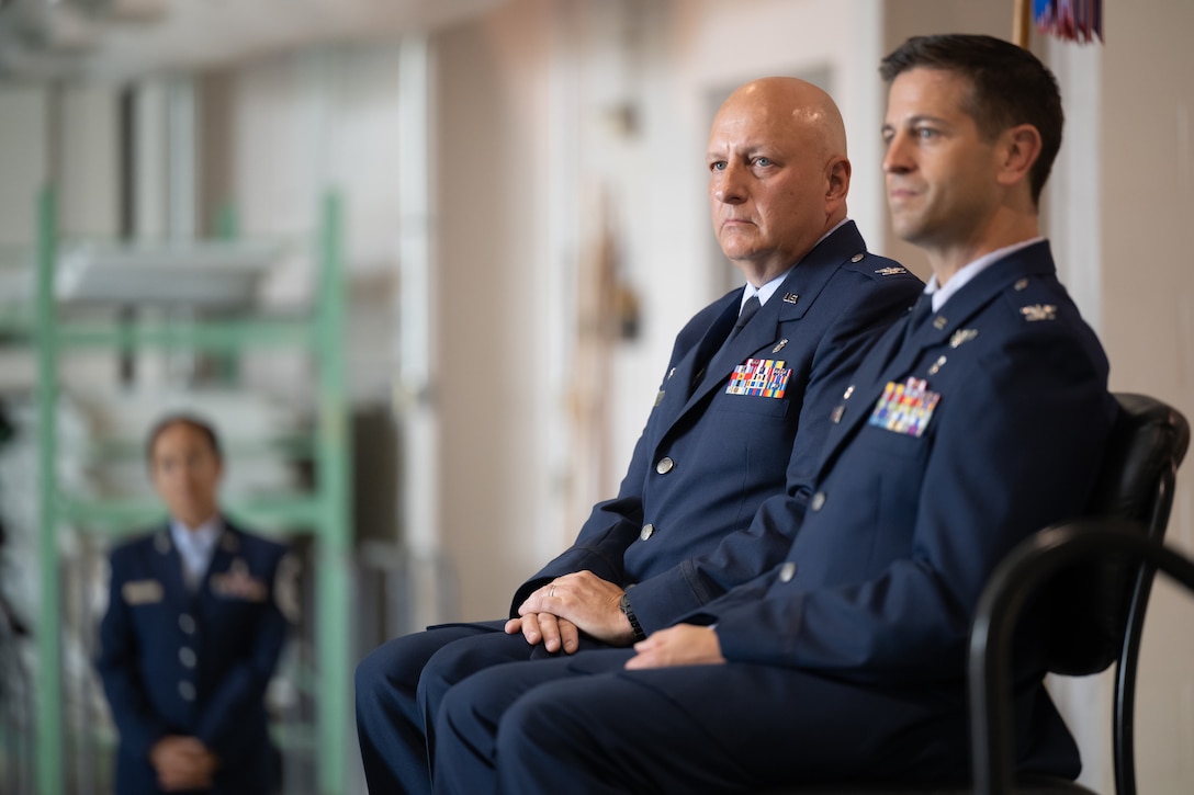 Col. Michael A. Cooper, left, commander of the 123rd Medical Group, retires from military service during a ceremony at the Kentucky Air National Guard Base in Louisville, Ky., Sept. 11, 2022. Col. Hans F. Otto, right, is the unit's new commander. (U.S. Air National Guard photo by Dale Greer)