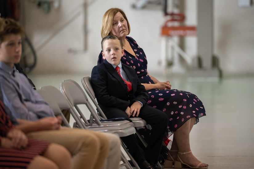 Family members attend a ceremony during which Col. Michael A. Cooper retired as commander of the 123rd Medical Group at the Kentucky Air National Guard Base in Louisville, Ky., Sept. 11, 2022. Cooper has led the group since 2014. (U.S. Air National Guard photo by Dale Greer)