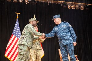 MANAMA, Bahrain (Dec. 12, 2022) Egyptian Navy Rear Adm. Mahmoud Abdelsattar, right, shakes hands with Capt. Robert Francis, the outgoing commander of Combined Task Force (CTF) 153, during a change of command ceremony in Manama, Bahrain, Dec. 12. Francis turned over U.S. Navy command of the newly formed international Red Sea task force, CTF 153, to the Egyptian Navy during a ceremony in Bahrain where the multinational staff is headquartered.