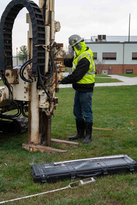 Rock Water Drilling company uses a geoprobe machine to collect soil borings as part of a remedial investigation for per- and polyfluoroalkyl substances (PFAS) at the 167th Airlift Wing, Shepherd Field, Martinsburg, West Virginia, Nov. 15, 2022. The borings are classified by geologists and samples are collected for further lab testing. The remedial investigation is part of a long-term study to determine the extent of PFAS in the ground at the base. The PFAS contamination has been attributed to the use of aqueous film forming foam previously used to fight fuel fires. (U.S. Air National Guard photos by Airman James DeCicco)
