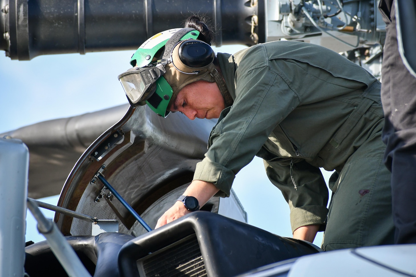 Maj. Brittany Fayos, Rotary Wing Division deputy and CH-53 pilot at Fleet Readiness Center East (FRCE), conducts a functional check flight inspection prior to the delivery of a recently overhauled CH-53 helicopter to the fleet.