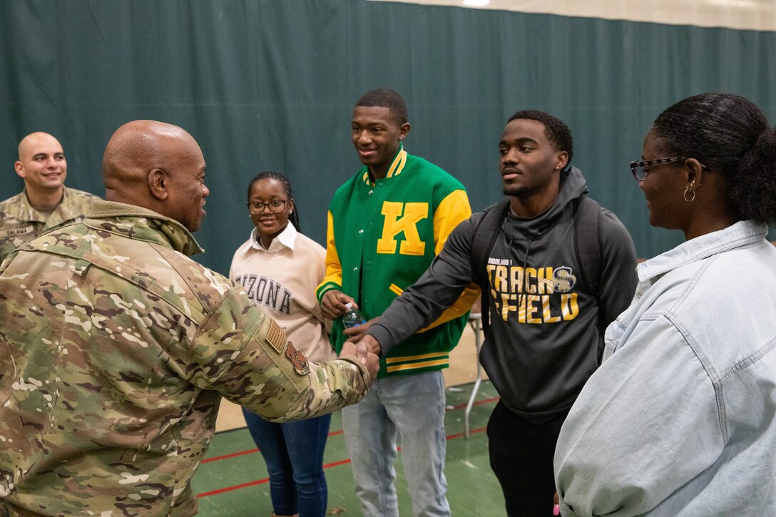 Senior Enlisted Advisor Tony Whitehead (left) shakes hands with cadets of the Kentucky State University's Reserve Officer Training Corps at the college's campus in Frankfort, Ky. on Dec. 6, 2022. Whitehead is visiting historically black colleges and universities to talk to cadets about their ROTC programs. (U.S. Army photo by Staff Sgt. Andrew Dickson)
