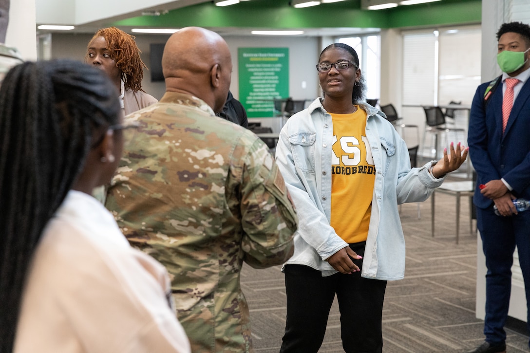 Senior Enlisted Advisor Tony Whitehead (left) shakes hands with cadets of the Kentucky State University's Reserve Officer Training Corps at the college's campus in Frankfort, Ky. on Dec. 6, 2022. Whitehead is visiting historically black colleges and universities to talk to cadets about their ROTC programs. (U.S. Army photo by Staff Sgt. Andrew Dickson)