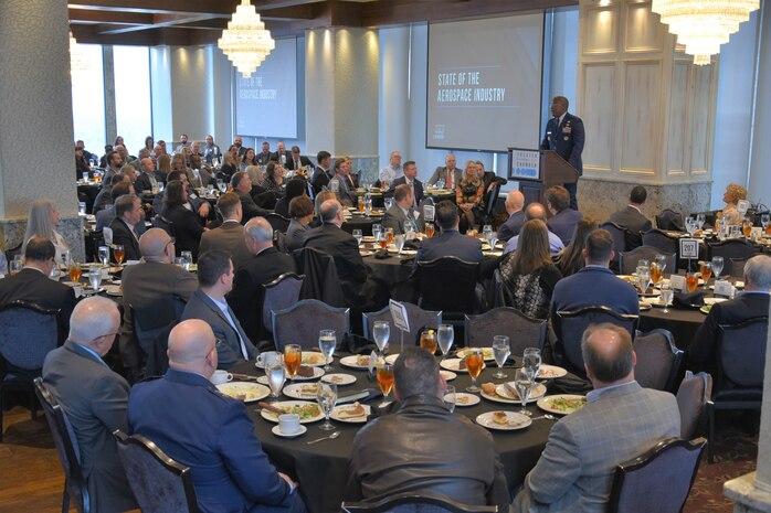 Approximately 300 attendees of the Dec. 2 State of the Aerospace Industry
Luncheon listen as Air Force Sustainment Center Commander Lt. Gen. Stacey
Hawkins discusses the importance of healthy public-private partnerships
between the Air Force, defense industry and the community.