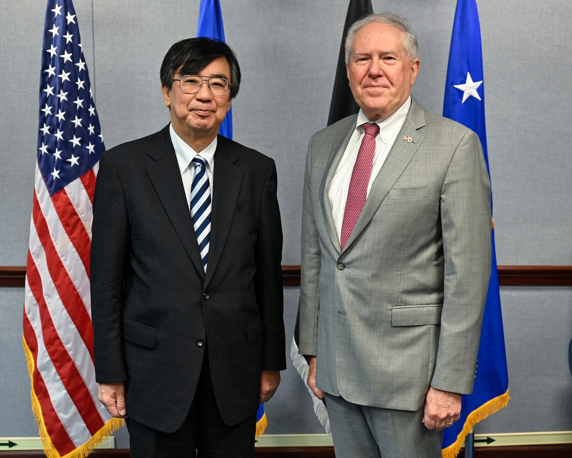 Secretary of the Air Force Frank Kendall, right, poses with Hideki Tsuchimoto, commissioner of the Acquisition, Technology and Logistics Agency, Japanese Ministry of Defense.