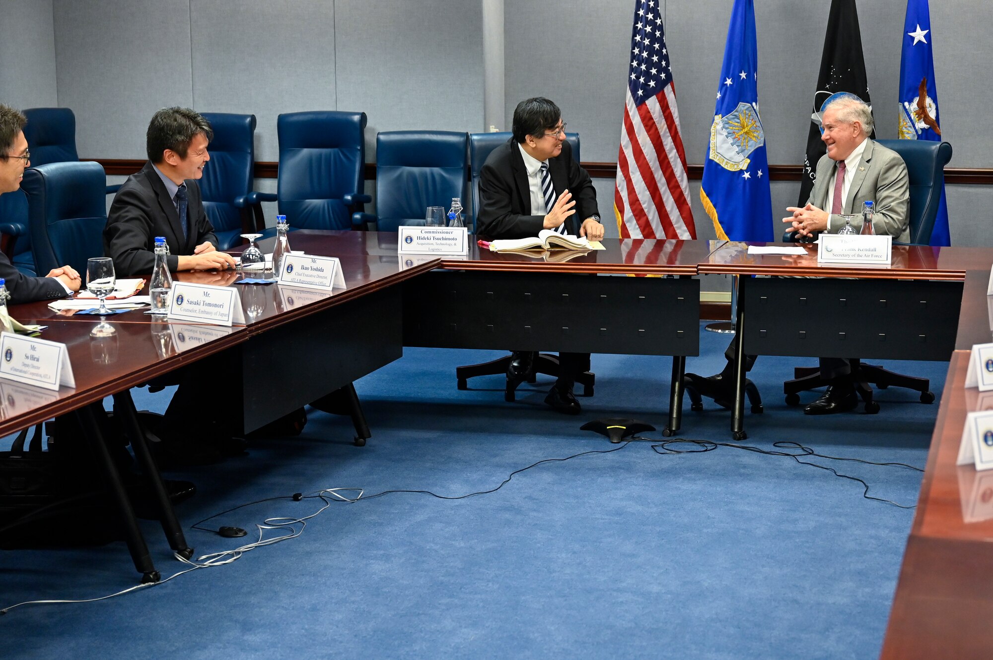 Secretary of the Air Force Frank Kendall speaks with Hideki Tsuchimoto, commissioner of the Acquisition, Technology and Logistics Agency, Japanese Ministry of Defense.