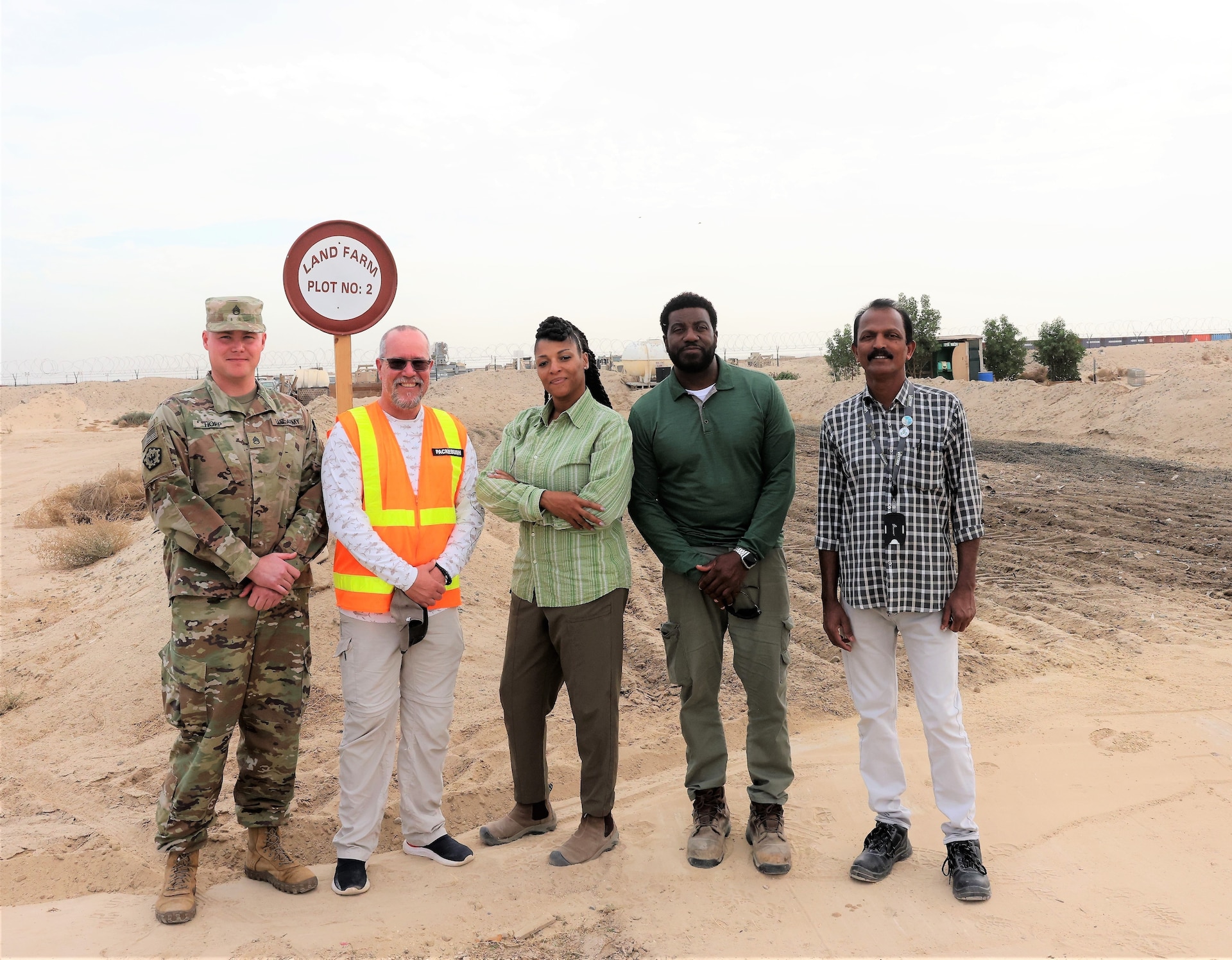 The ERC Team: Staff Sgt. Anthony Hopp, environmental noncommissioned officer, ASG-KU; Kenny Packebush, supervisor, Environmental Recycling, ASG-KU; Lise Devilme, supervisor, Free Issue, ASG-KU; Vernon Lane, supervisor, ERC, ASG-KU; Dhanesan Pakkan, lead, Recycling, ASG-KU. Dedicated and hard at work, Arifjan, Kuwait, November 30, 2022.