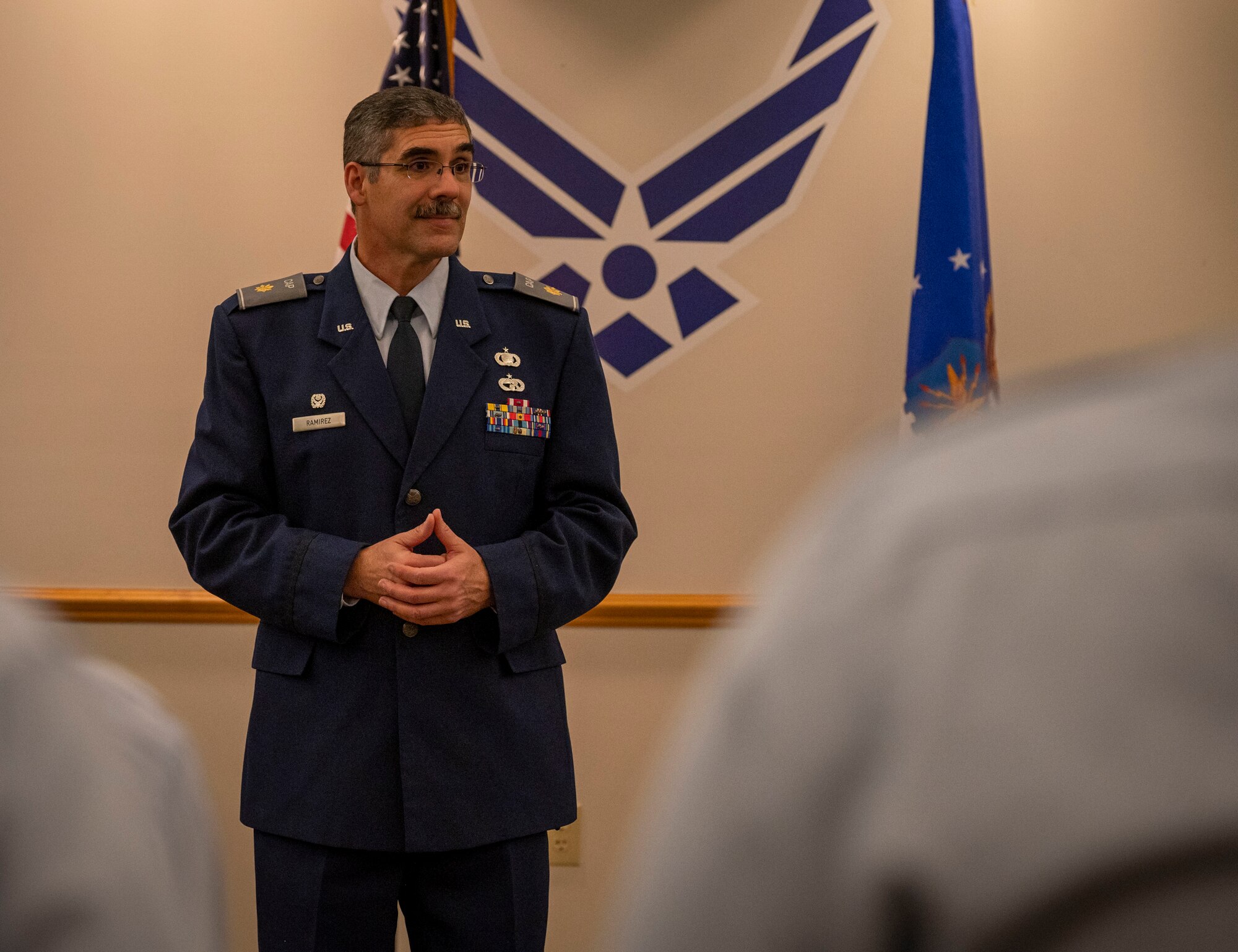 Lt. Col. David Ramirez, 916th Operations Support Squadron deputy chief of wing intelligence and Goldsboro Civil Air Patrol instructor, speaks to Goldsboro CAP cadets about the importance of the base honor guard at Seymour Johnson Air Force Base, North Carolina, Dec. 7, 2022. Ramirez has volunteered with the group for three years, and continues to help promote activities to develop leaders and inform them about the military. (U.S. Air Force photo by Airman 1st Class Sabrina Fuller)