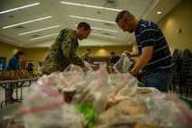 Team Charleston volunteers sort cookies.