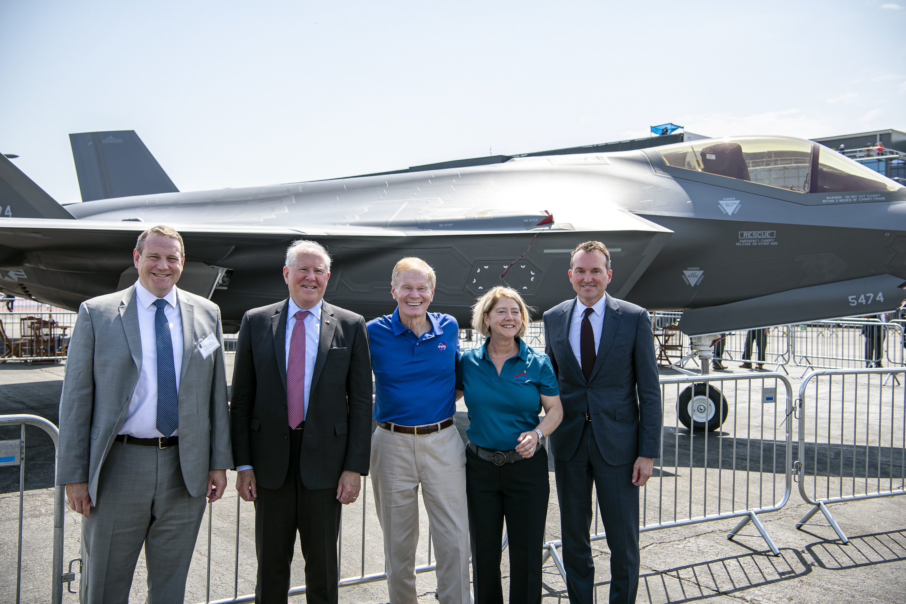 Secretary of the Air Force Frank Kendall, center left, poses for a photo along with Bill Nelson, center, NASA administrator, and other attendees at the Farnborough International Airshow, England, July 18, 2022. Kendall attended the airshow to meet with air and space defense officials from other nations and demonstrate the Department of the Air Force’s commitment to its allies and partners. (U.S. Air Force photo by Staff Sgt. Eugene Oliver)